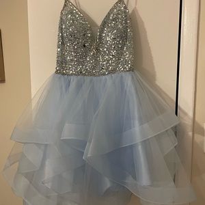 Formal short prom dress. Never worn with tags. Junior size Large. Light blue